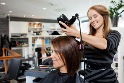 Hair Stylist Blow Drying Client